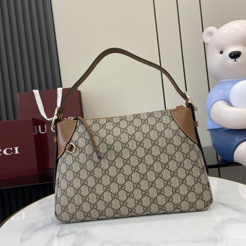 G*u*i top handle bags